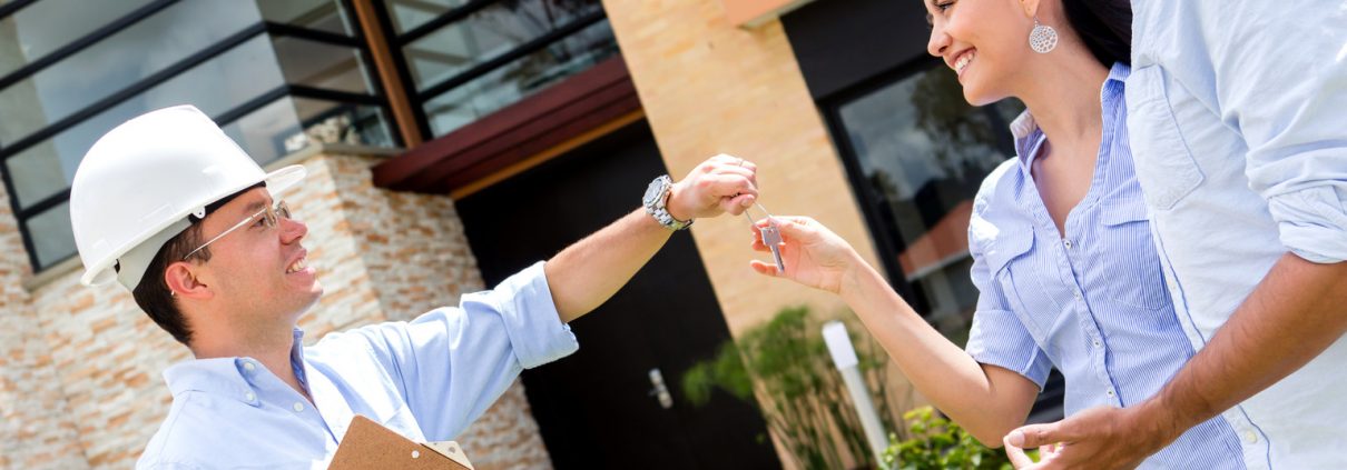 Architect Handling Keys To A Couple | Recycling Services | Storage Container Rentals | Parberry Environmental Solutions