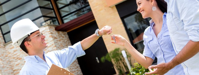 Architect Handling Keys To A Couple | Recycling Services | Storage Container Rentals | Parberry Environmental Solutions